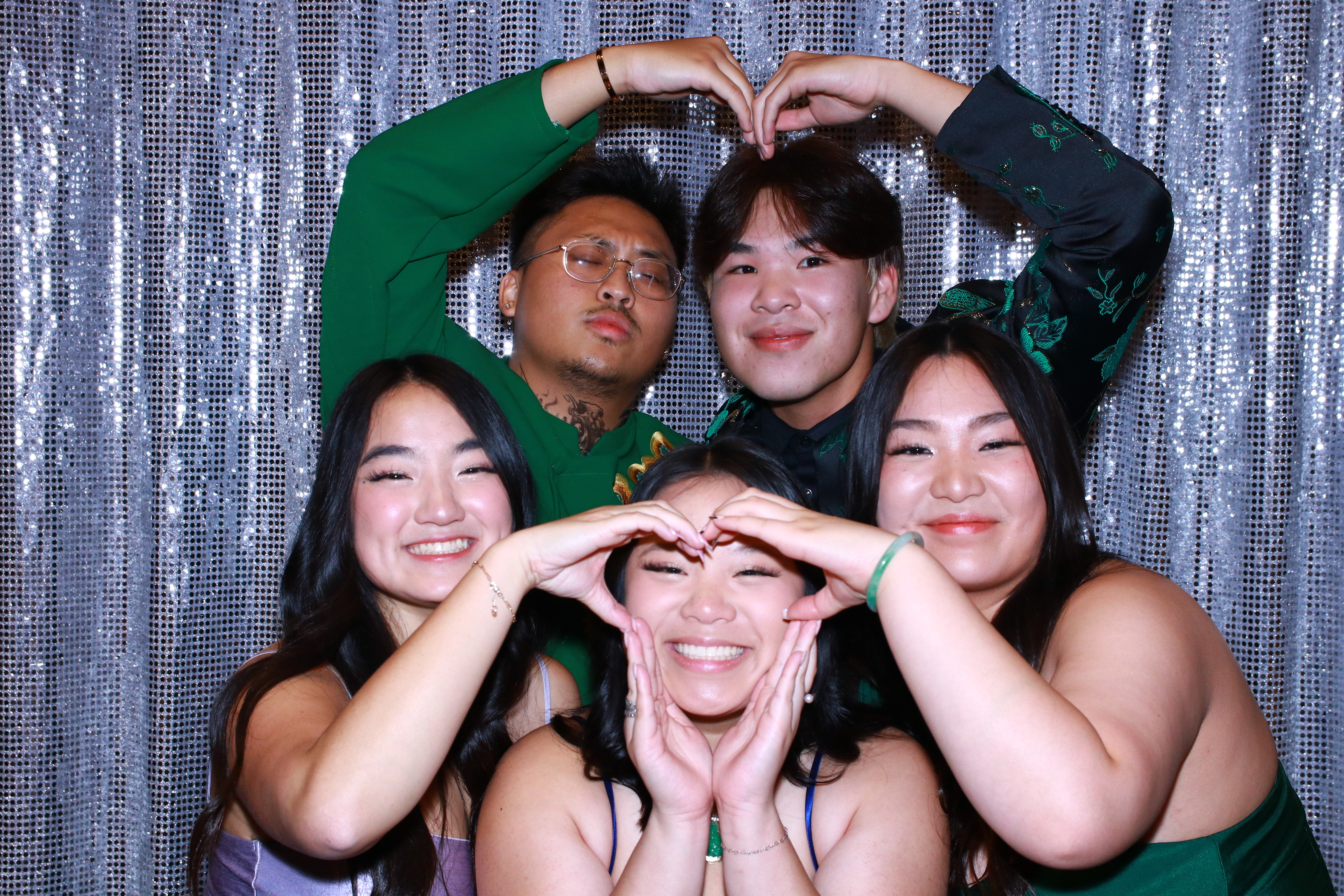 This is a photo of a group of students taking photos using Dat Le Studios's Photo booth